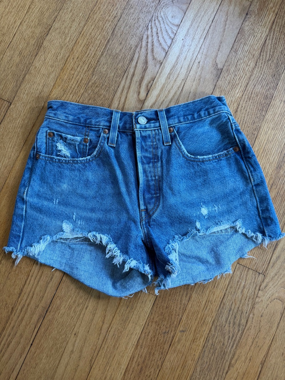 Levi's Medium Blue Distressed Cutoff Denim Shorts